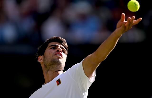 (250703) -- LONDON, July 3, 2025 (Xinhua) -- Carlos Alcaraz serves during the men's singles second round match between Carlos Alcaraz of Spain and Oliver Tarvet of Britain at the Wimbledon Tennis Championships in London, Britain, July 2, 2025. (Xinhua/Li Ying)