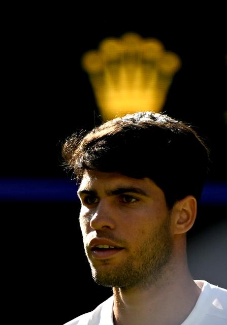 (250703) -- LONDON, July 3, 2025 (Xinhua) -- Carlos Alcaraz reacts during the men's singles second round match between Carlos Alcaraz of Spain and Oliver Tarvet of Britain at the Wimbledon Tennis Championships in London, Britain, July 2, 2025. (Xinhua/Li Ying)