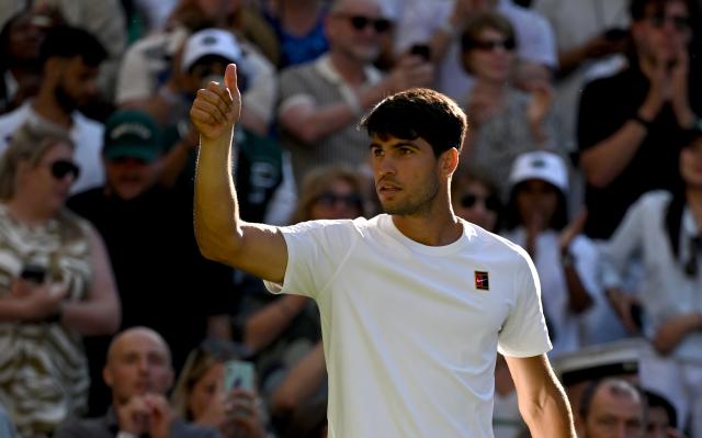 (250703) -- LONDON, July 3, 2025 (Xinhua) -- Carlos Alcaraz celebrates after winning the men's singles second round match between Carlos Alcaraz of Spain and Oliver Tarvet of Britain at the Wimbledon Tennis Championships in London, Britain, July 2, 2025. (Xinhua/Li Ying)