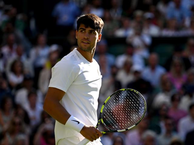 (250703) -- LONDON, July 3, 2025 (Xinhua) -- Carlos Alcaraz reacts during the men's singles second round match between Carlos Alcaraz of Spain and Oliver Tarvet of Britain at the Wimbledon Tennis Championships in London, Britain, July 2, 2025. (Xinhua/Li Ying)