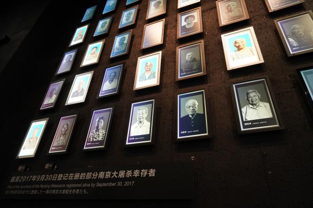 (250703) -- NANJING, July 3, 2025 (Xinhua) -- This photo taken on July 2, 2025 shows the lightboxes of Liu Guixiang (2nd R, bottom) and Xie Guiying (1st R, bottom) on a photo wall featuring survivors of the Nanjing Massacre at the Memorial Hall of the Victims in Nanjing Massacre by Japanese Invaders in Nanjing, east China's Jiangsu Province. A "lights out" ceremony for two survivors of the Nanjing Massacre who passed away this year was held here on Wednesday. On a photo wall featuring survivors of the Nanjing Massacre, the lightboxes of Liu Guixiang and Xie Guiying were dimmed off, and their colored photos then turned to black and white.
   With the passing away of Liu and Xie earlier this year, the number of living registered survivors has decreased to 26. (Photo by Liu Zhenrui/Xinhua)