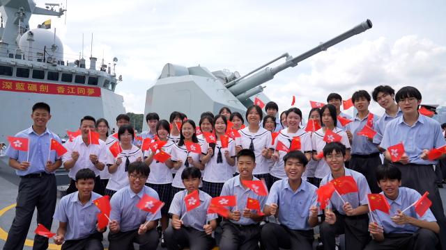 (250703) -- HONG KONG, July 3, 2025 (Xinhua) -- Hong Kong students pose for a group photo while visiting the Yuncheng missile frigate in Hong Kong, south China, July 3, 2025. A fleet of the Chinese People's Liberation Army (PLA) Navy led by the aircraft carrier Shandong arrived in the Hong Kong Special Administrative Region (HKSAR) on Thursday morning, kicking off a five-day visit.
   The aircraft carrier and the Yan'an missile destroyer were anchored near the west end of the Victoria Harbor, while the Zhanjiang missile destroyer and the Yuncheng missile frigate docked at the PLA Hong Kong Garrison's naval base in Stonecutters Island.
   This is the Shandong's first visit to Hong Kong. From Friday to Sunday, the Shandong, the Zhanjiang and the Yuncheng will host open tours, lectures, drill demonstrations and other exchange activities. (Photo by Duan Zhenjun/Xinhua)