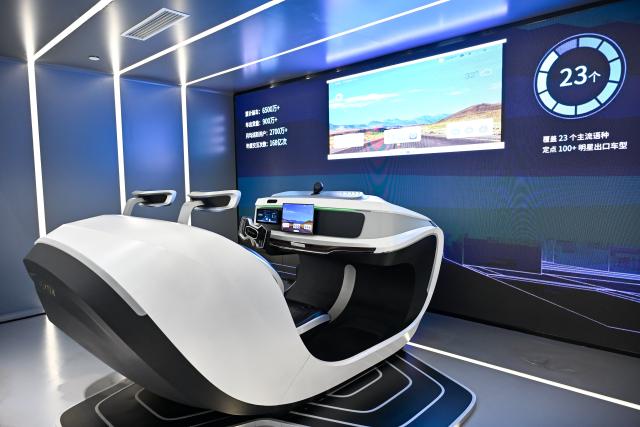 (250703) -- HEFEI, July 3, 2025 (Xinhua) -- This photo shows a "Spark Desk" from iFLYTEK at the artificial intelligence experience hall of iFLYTEK in Hefei, east China's Anhui Province, July 2, 2025. In alignment with the national strategy to cultivate industries of the future, Hefei is forging ahead with strategic layouts in emerging frontiers like quantum information, low-altitude economy, commercial aerospace, fusion energy, artificial intelligence, intelligent robotics, and biosynthetic manufacturing to accelerate industrial cluster formation. The city has achieved remarkable progress across multiple future industry sectors, emerging as a robust hub of rapid advancement. (Xinhua/Zhang Cheng)