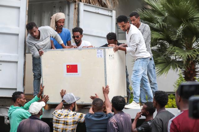 (250704) -- BEIJING, July 4, 2025 (Xinhua) -- People unload medical supplies from a truck at the Tirunesh-Beijing Hospital, on the outskirts of Addis Ababa, Ethiopia, on July 2, 2025. The 25th batch of the Chinese medical team in Ethiopia has donated much-needed medical supplies to the Tirunesh-Beijing Hospital, also known as the Ethio-China Friendship Hospital, located on the outskirts of Addis Ababa. (Xinhua/Michael Tewelde)