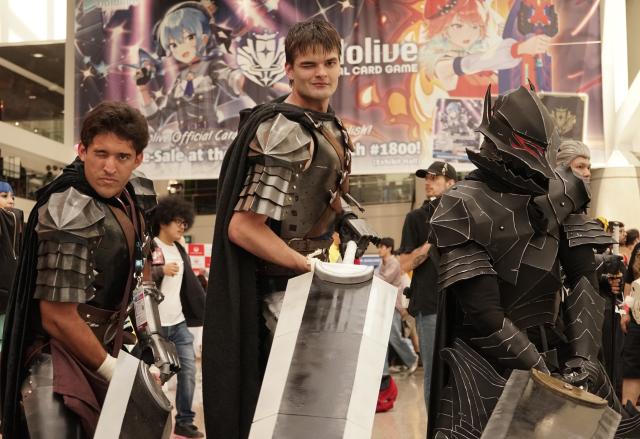 (250704) -- LOS ANGELES, July 4, 2025 (Xinhua) -- Anime fans dressed up as comic and animation characters pose for photos during the Anime Expo 2025 at the Los Angeles Convention Center in Los Angeles, the United States, on July 3, 2025.
  The largest anime convention in North America, Anime Expo, opened here on Thursday, drawing fans and industry professionals from around the world to celebrate the Japanese pop culture.
   Since its debut in 1992, Anime Expo has become a major showcase for Japanese entertainment, including anime, fashion, video games, and music. (Photo by Zeng Hui/Xinhua)