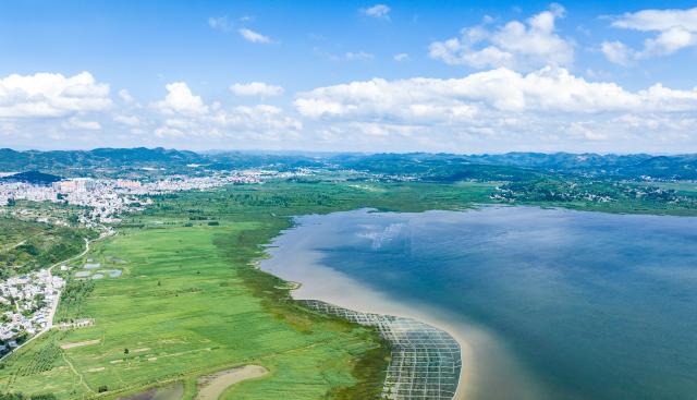 (250704) -- WEINING, July 4, 2025 (Xinhua) -- An aerial drone photo taken on July 3, 2025 shows the scenery of Caohai National Nature Reserve in the Yi-Hui-Miao Autonomous County of Weining, southwest China's Guizhou Province. (Xinhua/Tao Liang)