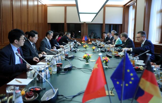 (250704) -- BERLIN, July 4, 2025 (Xinhua) -- Chinese Foreign Minister Wang Yi, also a member of the Political Bureau of the Communist Party of China Central Committee, co-chairs the eighth round of China-Germany Strategic Dialogue on Diplomacy and Security with German Foreign Minister Johann Wadephul in Berlin, Germany, July 3, 2025. (Xinhua/Du Zheyu)