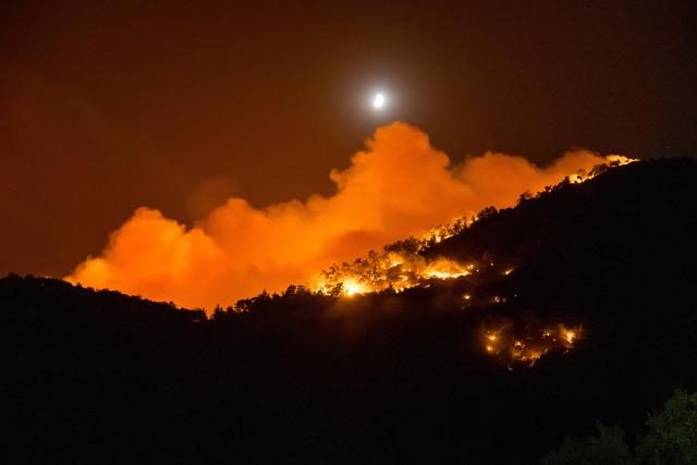 (250704) -- IZMIR, July 4, 2025 (Xinhua) -- This photo taken on July 2, 2025 shows a wildfire in the Odemis district of Izmir, Türkiye. Izmir Governor Suleyman Elban said on Thursday that the wildfire erupted on Wednesday afternoon in the Cesme district, a popular coastal tourist destination. The blaze has been taken under control, but the inland district of Odemis remains uncontrolled, he added.
According to Elban, the fires were caused by faults in electricity distribution lines and there are no signs of sabotage. (Mustafa Kaya/Handout via Xinhua)