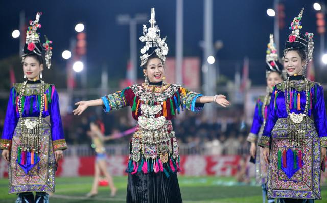 (250704) -- GUIYANG, July 4, 2025 (Xinhua) -- Chorus members perform the grand song of the Dong ethnic group in "Ne Zha 2" during the  "Village Super League," or "Cun Chao," in Rongjiang County, southwest China's Guizhou Province, March 14, 2025. (Xinhua/Yang Wenbin)