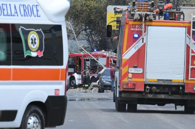 (250704) -- ROME, July 4, 2025 (Xinhua) -- This photo taken on July 4, 2025 shows rescuers working at the site of the explosion in Rome, Italy. An explosion ripped through a gas station in eastern Rome on Friday morning, injuring at least 21 people.
  According to local authorities, the explosion took place at a gas station on Via Gordiani in the Prenestino district of eastern Rome. While none of the injured were in critical condition, five people were hospitalized for treatment. Some of the casualties included rescue workers responding to the scene. (Photo by Alberto Lingria/Xinhua)