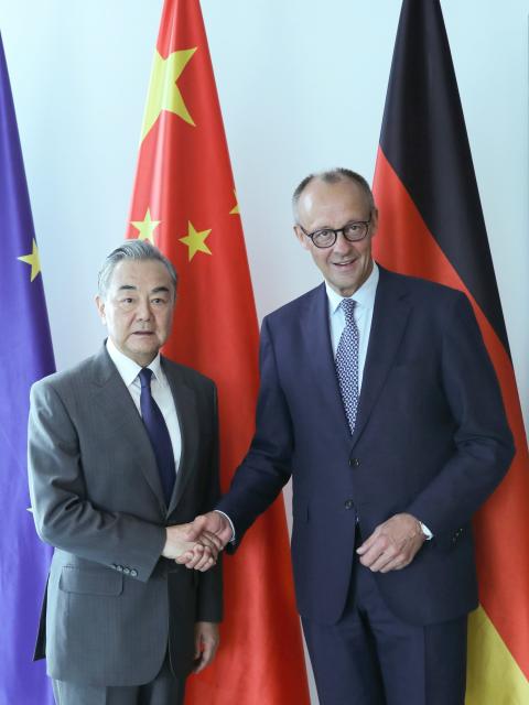 (250704) -- BERLIN, July 4, 2025 (Xinhua) -- Chinese Foreign Minister Wang Yi, also a member of the Political Bureau of the Communist Party of China Central Committee, meets with German Chancellor Friedrich Merz in Berlin, Germany, July 4, 2025. (Xinhua/Du Zheyu)