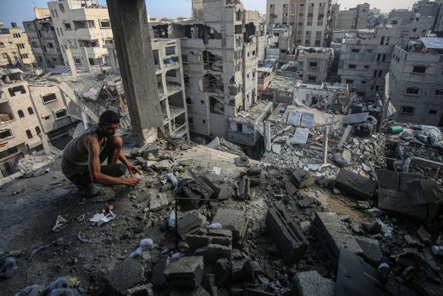 (250705) -- GAZA, July 5, 2025 (Xinhua) -- A Palestinian inspects a destroyed house after an Israeli airstrike in the al-Shati refugee camp, west of Gaza City, on July 4, 2025. (Photo by Rizek Abdeljawad/Xinhua)