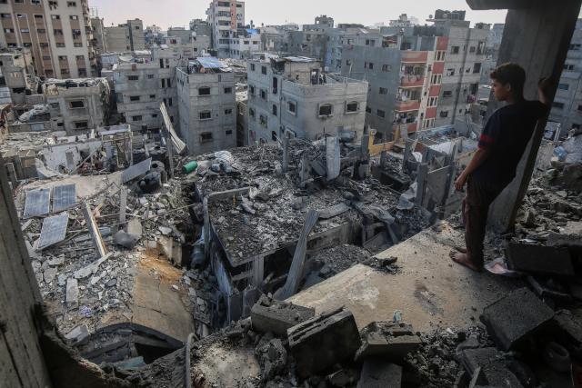 (250705) -- GAZA, July 5, 2025 (Xinhua) -- A Palestinian inspects destroyed houses after an Israeli airstrike in the al-Shati refugee camp, west of Gaza City, on July 4, 2025. (Photo by Rizek Abdeljawad/Xinhua)