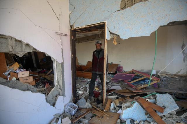 (250705) -- GAZA, July 5, 2025 (Xinhua) -- A Palestinian inspects a destroyed house after an Israeli airstrike in the al-Shati refugee camp, west of Gaza City, on July 4, 2025. (Photo by Rizek Abdeljawad/Xinhua)