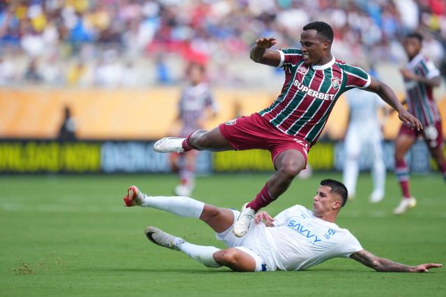 (250705) -- ORLANDO, July 5, 2025 (Xinhua) -- Jhon Arias (top) of Fluminense FC competes during the quarterfinal match between Fluminense FC of Brazil and Al Hilal of Saudi Arabia at the FIFA Club World Cup 2025 at the Camping World Stadium, Orlando, Florida, the United States, July 4 , 2025. (Xinhua/Xu Chang)