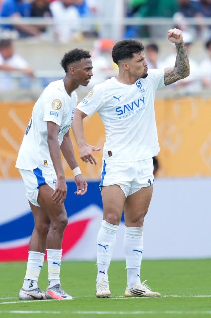 (250705) -- ORLANDO, July 5, 2025 (Xinhua) -- Marcos Leonardo (R) of Al Hilal celebrates scoring during the quarterfinal match between Fluminense FC of Brazil and Al Hilal of Saudi Arabia at the FIFA Club World Cup 2025 at the Camping World Stadium, Orlando, Florida, the United States, July 4 , 2025. (Xinhua/Xu Chang)