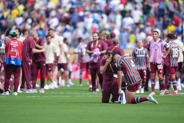 (250705) -- ORLANDO, July 5, 2025 (Xinhua) -- Ignacio (front R) of Fluminense FC celebrates after the quarterfinal match between Fluminense FC of Brazil and Al Hilal of Saudi Arabia at the FIFA Club World Cup 2025 at the Camping World Stadium, Orlando, Florida, the United States, July 4 , 2025. (Xinhua/Xu Chang)