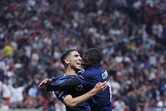 (250706) -- ATLANTA, July 6, 2025 (Xinhua) -- Ousmane Dembele (R) of Paris Saint-Germain celebrates scoring with Achraf Hakimi during the quarterfinal match between Paris Saint-Germain (FRA) and FC Bayern Munich (GER) at the FIFA Club World Cup 2025 at the Mercedes-Benz Stadium, Atlanta, Georgia, the United States, July 5, 2025. (Xinhua/Li Ming)