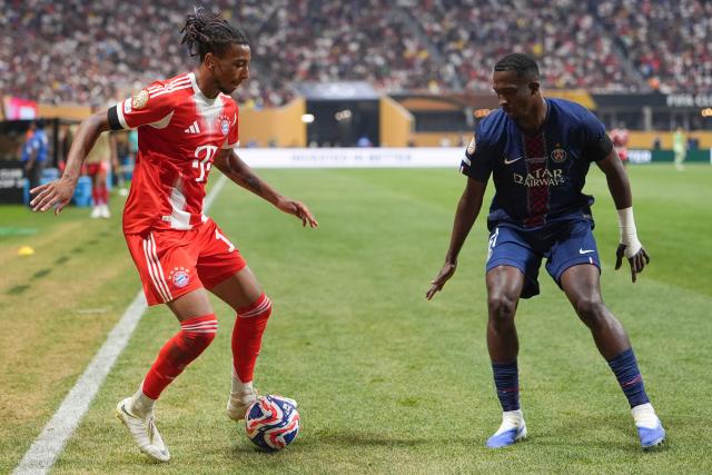 (250706) -- ATLANTA, July 6, 2025 (Xinhua) -- Michael Olise (L) of FC Bayern Munich vies with Willian Pacho of Paris Saint-Germain during the quarterfinal match between Paris Saint-Germain (FRA) and FC Bayern Munich (GER) at the FIFA Club World Cup 2025 at the Mercedes-Benz Stadium, Atlanta, Georgia, the United States, July 5, 2025. (Xinhua/Huang Zongzhi)
