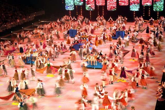 (250706) -- RIGA, July 6, 2025 (Xinhua) -- Participants perform during the 13th Latvian School Youth Song and Dance Festival in Riga, Latvia, July 5, 2025.
  The festival, which is held every five years, is one of the biggest children's and youth culture and art event in the country. (Photo by Edijs Palens/Xinhua)