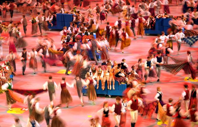 (250706) -- RIGA, July 6, 2025 (Xinhua) -- Participants perform during the 13th Latvian School Youth Song and Dance Festival in Riga, Latvia, July 5, 2025.
  The festival, which is held every five years, is one of the biggest children's and youth culture and art event in the country. (Photo by Edijs Palens/Xinhua)