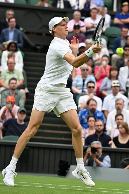 (250706) -- LONDON, July 6, 2025 (Xinhua) -- Jannik Sinner hits a return during the men's singles third round match between Jannik Sinner of Italy and Pedro Martinez of Spain at the Wimbledon Tennis Championships in London, Britain, July 5, 2025. (Xinhua/Zhao Dingzhe)