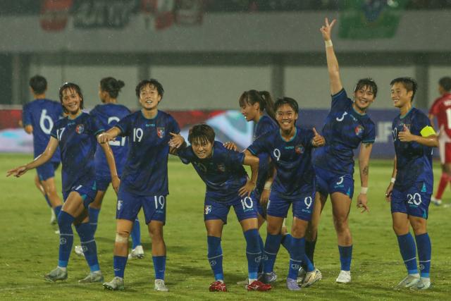 (250706) -- TANGERANG, July 6, 2025 (Xinhua) -- Players of Chinese Taipei celebrate scoring during the AFC Women's Asian Cup 2026 Qualifiers Group D football match between Indonesia and Chinese Taipei in Tangerang, Indonesia, July 5, 2025. (Xinhua/Claudio)