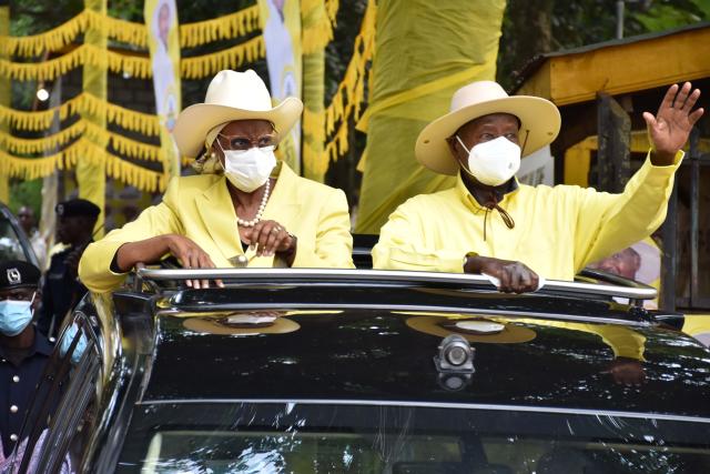 (250706) -- KAMPALA, July 6, 2025 (Xinhua) -- Ugandan President Yoweri Museveni (R) and his wife wave to supporters after the nomination in Kampala, Uganda, July 5, 2025.
  Ugandan President Yoweri Museveni was on Saturday nominated as the sole candidate to represent the ruling party in next year's presidential election.
  TO GO WITH "Ugandan leader nominated as ruling party's presidential candidate for 2026 polls" (Photo by Nicholas Kajoba/Xinhua)