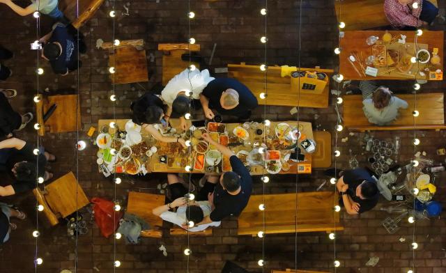 (250706) -- HARBIN, July 6, 2025 (Xinhua) -- A drone photo shows visitors enjoying food and beer at the 23rd Harbin International Beer Festival in Harbin, northeast China's Heilongjiang Province, July 5, 2025.
  The beer festival kicked off here Saturday night, showcasing more than 1,000 varieties of beer from over 10 countries and regions. (Photo by Zhang Shu/Xinhua)