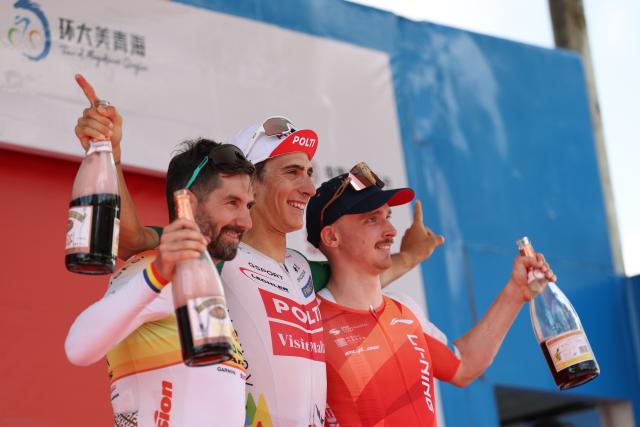 (250706) -- XINING, July 6, 2025 (Xinhua) -- First placed Manuel Penalver Aniorte (C) of Team Polti Visitmalta, second placed Eduard-Michael Grosu (L) of Huansheng-Vonoa-Taishan Sport Team and third placed Alexander Salby of Li Ning Star celebrate on the podium after Stage 1 of the Tour of Magnificent Qinghai international road cycling race in Xining, northwest China's Qinghai Province, July 6, 2025. (Xinhua/Zhang Long)