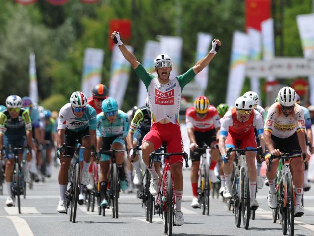 (250706) -- XINING, July 6, 2025 (Xinhua) -- Manuel Penalver Aniorte (front) of Team Polti Visitmalta celebrates winning Stage 1 of the Tour of Magnificent Qinghai international road cycling race in Xining, northwest China's Qinghai Province, July 6, 2025. (Xinhua/Zhang Long)