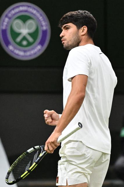 (250707) -- LONDON, July 7, 2025 (Xinhua) -- Carlos Alcaraz reacts during the men's singles fourth round match between Carlos Alcaraz of Spain and Andrey Rublev of Russia at the Wimbledon Tennis Championships in London, Britain, July 6, 2025. (Xinhua/Zhao Dingzhe)