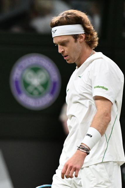 (250707) -- LONDON, July 7, 2025 (Xinhua) -- Andrey Rublev reacts during the men's singles fourth round match between Carlos Alcaraz of Spain and Andrey Rublev of Russia at the Wimbledon Tennis Championships in London, Britain, July 6, 2025. (Xinhua/Zhao Dingzhe)