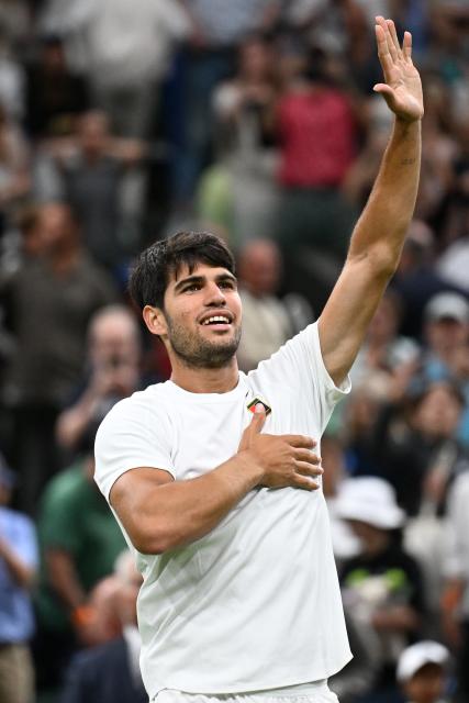 (250707) -- LONDON, July 7, 2025 (Xinhua) -- Carlos Alcaraz celebrates after the men's singles fourth round match between Carlos Alcaraz of Spain and Andrey Rublev of Russia at the Wimbledon Tennis Championships in London, Britain, July 6, 2025. (Xinhua/Zhao Dingzhe)