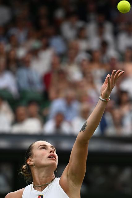 (250707) -- LONDON, July 7, 2025 (Xinhua) -- Aryna Sabalenka serves during the women's singles fourth round match between Aryna Sabalenka of Belarus and Elise Mertens of Belgium at the Wimbledon Tennis Championships in London, Britain, July 6, 2025. (Xinhua/Zhao Dingzhe)
