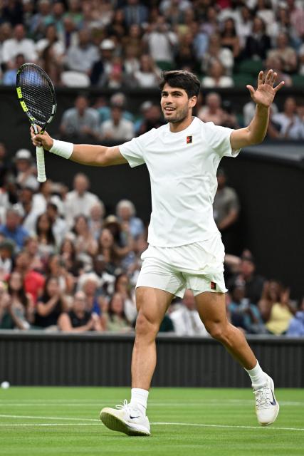 (250707) -- LONDON, July 7, 2025 (Xinhua) -- Carlos Alcaraz celebrates after the men's singles fourth round match between Carlos Alcaraz of Spain and Andrey Rublev of Russia at the Wimbledon Tennis Championships in London, Britain, July 6, 2025. (Xinhua/Zhao Dingzhe)