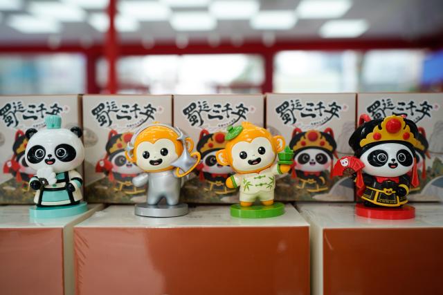 (250708) -- CHENGDU, July 8, 2025 (Xinhua) -- This photo taken on July 8, 2025 shows products on display at an official licensed products store for the World Games 2025 in Chengdu, southwest China's Sichuan Province. The Games hit the 30-day countdown mark today and will be held from August 7 to 17. (Xinhua/Xu Bingjie)