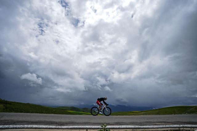 (250708) -- MENYUAN, July 8, 2025 (Xinhua) -- Simon Peliaud of Li Ning Star competes during the Stage 3 of the Tour of Magnificent Qinghai International Road Cycling Race from Huzhu to Menyuan, northwest China's Qinghai Province, July 8, 2025. (Xinhua/Qi Zhiyue)