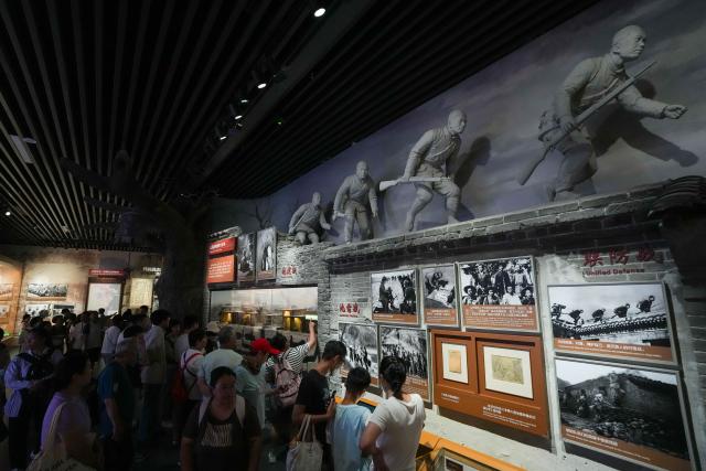 (250708) -- BEIJING, July 8, 2025 (Xinhua) -- People visit an exhibition themed "For National Liberation and World Peace" at the Museum of the War of Chinese People's Resistance Against Japanese Aggression in Beijing, capital of China, July 8, 2025. The exhibition commemorating the 80th anniversary of the victory in the Chinese People's War of Resistance Against Japanese Aggression and the World Anti-Fascist War opened to public here on Tuesday.
   The exhibition features 1,525 photos and 3,237 artifacts across an area of 12,200 square meters. (Xinhua/Ju Huanzong)