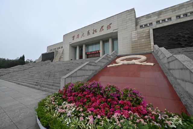 (250708) -- YANGQUAN, July 8, 2025 (Xinhua) -- This photo taken on July 7, 2025 shows an exterior view of the memorial hall commemorating the Hundred-Regiment Campaign in Yangquan, north China's Shanxi Province. The Hundred-Regiment Campaign took place in northern China from August 1940 to January 1941 during the Chinese People's War of Resistance Against Japanese Aggression. (Xinhua/Zhan Yan)