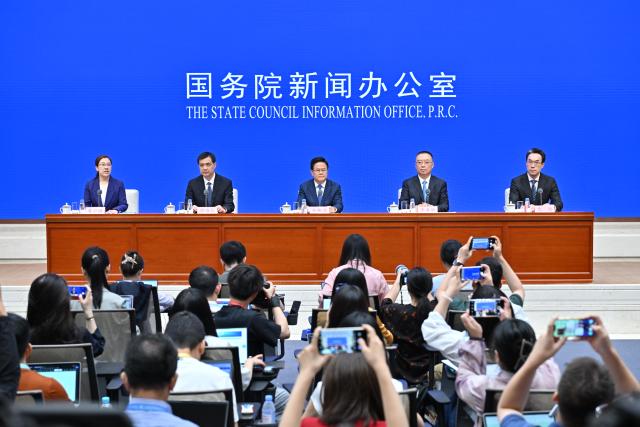 (250709) -- BEIJING, July 9, 2025 (Xinhua) -- China's State Council Information Office (SCIO) holds a press conference on the country's high-quality fulfillment of targets set for the 14th Five-Year Plan period (2021-2025), in Beijing, capital of China, July 9, 2025. Zheng Shanjie, head of the National Development and Reform Commission (NDRC), Li Chunlin, deputy director of the NDRC, Zhou Haibing, deputy director of the NDRC, and Yuan Da, secretary general of the NDRC, presented achievements in social and economic development during the period and answered questions from the media. (Xinhua/Li Xin)