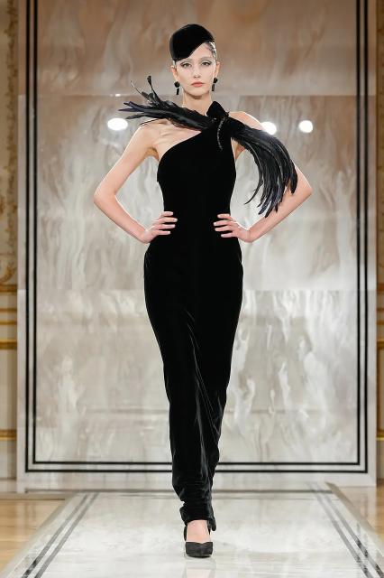 (250709) -- PARIS, July 9, 2025 (Xinhua) -- A model presents a creation from the haute couture Fall-Winter 2025/2026 collections by Giorgio Armani Prive during the Paris Haute Couture Week, in Paris, France, on July 8, 2025. (MeetEurope/Handout via Xinhua)