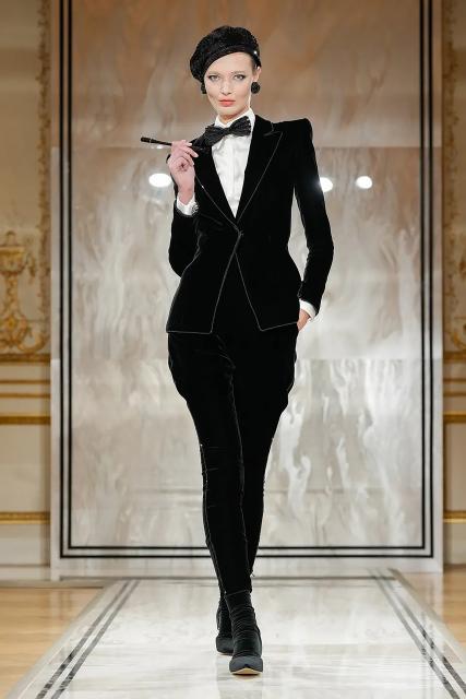 (250709) -- PARIS, July 9, 2025 (Xinhua) -- A model presents a creation from the haute couture Fall-Winter 2025/2026 collections by Giorgio Armani Prive during the Paris Haute Couture Week, in Paris, France, on July 8, 2025. (MeetEurope/Handout via Xinhua)