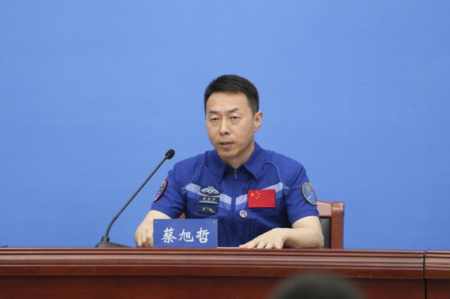(250709) -- BEIJING, July 9, 2025 (Xinhua) -- Astronaut Cai Xuzhe from China's Shenzhou-19 crewed mission speaks during a press conference in Beijing, capital of China, July 9, 2025. Astronauts Cai Xuzhe, Song Lingdong and Wang Haoze from China's Shenzhou-19 crewed mission met the press on Wednesday, their first public appearance after returning to Earth in April. (Xinhua/Li Yanchen)