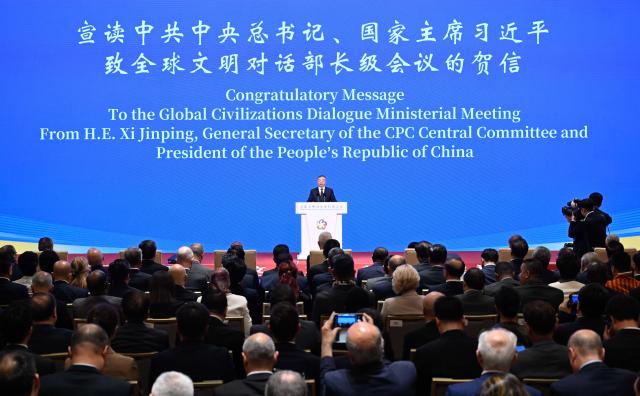 (250710) -- BEIJING, July 10, 2025 (Xinhua) -- Li Shulei, a member of the Political Bureau of the Communist Party of China (CPC) Central Committee and head of the Publicity Department of the CPC Central Committee, reads out a congratulatory letter from Chinese President Xi Jinping at the opening ceremony of the Global Civilizations Dialogue Ministerial Meeting in Beijing, capital of China, July 10, 2025. The Global Civilizations Dialogue Ministerial Meeting opened here on Thursday. (Xinhua/Shen Hong)