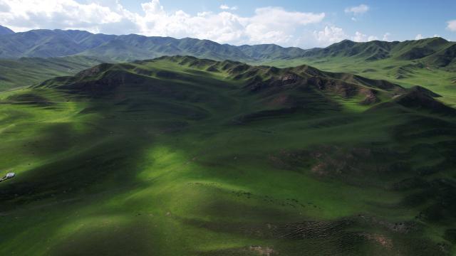 (250711) -- XIAHE, July 11, 2025 (Xinhua) -- An aerial drone photo taken on July 10, 2025 shows the scenery of the Sangke Grassland in Xiahe County, Gannan Tibetan Autonomous Prefecture, northwest China's Gansu Province. (Xinhua/Chen Bin)