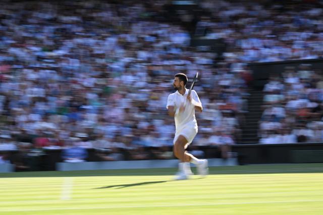 (250712) -- LONDON, July 12, 2025 (Xinhua) -- Novak Djokovic competes during the men's singles semifinal match between Jannik Sinner of Italy and Novak Djokovic of Serbia at the Wimbledon Tennis Championships in London, Britain, July 11, 2025. (Xinhua/Zhao Dingzhe)