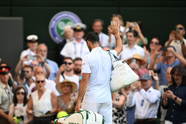 (250712) -- LONDON, July 12, 2025 (Xinhua) -- Novak Djokovic leaves the court after the men's singles semifinal match between Jannik Sinner of Italy and Novak Djokovic of Serbia at the Wimbledon Tennis Championships in London, Britain, July 11, 2025. (Xinhua/Zhao Dingzhe)