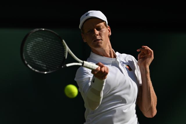 (250712) -- LONDON, July 12, 2025 (Xinhua) -- Jannik Sinner hits a return during the men's singles semifinal match between Jannik Sinner of Italy and Novak Djokovic of Serbia at the Wimbledon Tennis Championships in London, Britain, July 11, 2025. (Xinhua/Zhao Dingzhe)
