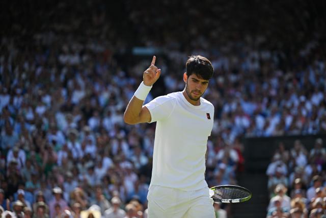 (250712) -- LONDON, July 12, 2025 (Xinhua) -- Carlos Alcaraz reacts during the men's singles semifinal match between Carlos Alcaraz of Spain and Taylor Fritz of the United States at the Wimbledon Tennis Championships in London, Britain, July 11, 2025. (Xinhua/Zhao Dingzhe)